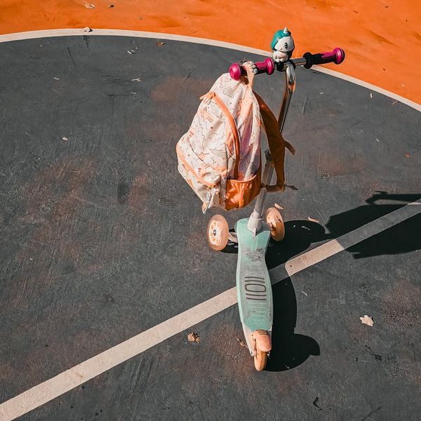 Person meditating peacefully in a bright, clean space.